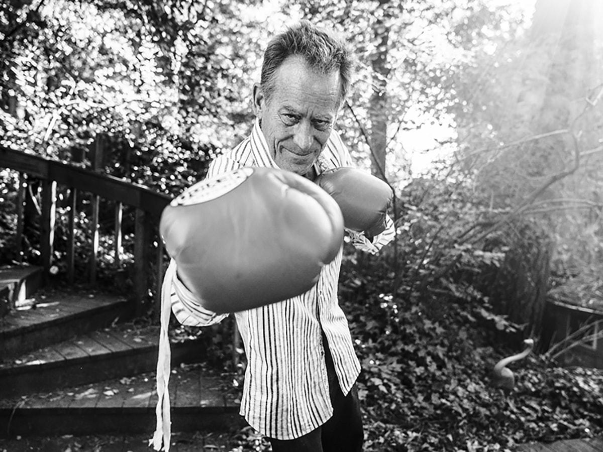 man with boxing gloves in B & W