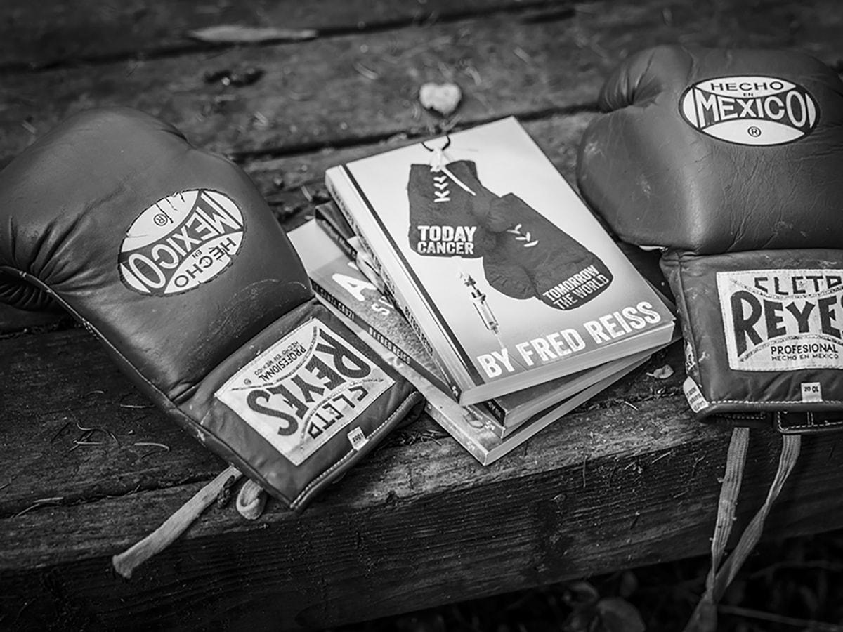 Boxing gloves and books