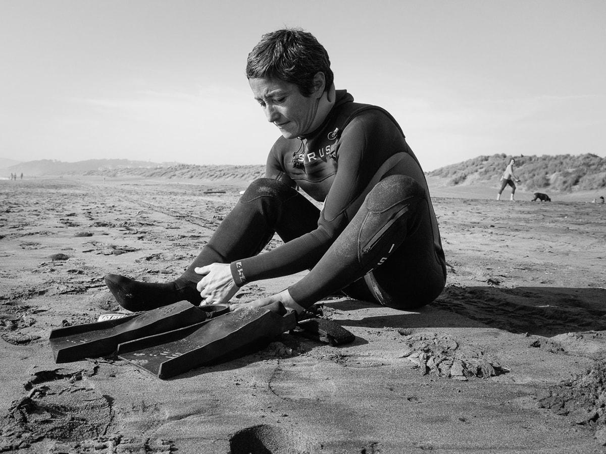 Woman sitting on beach