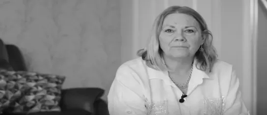 A black and white photo of Denise 