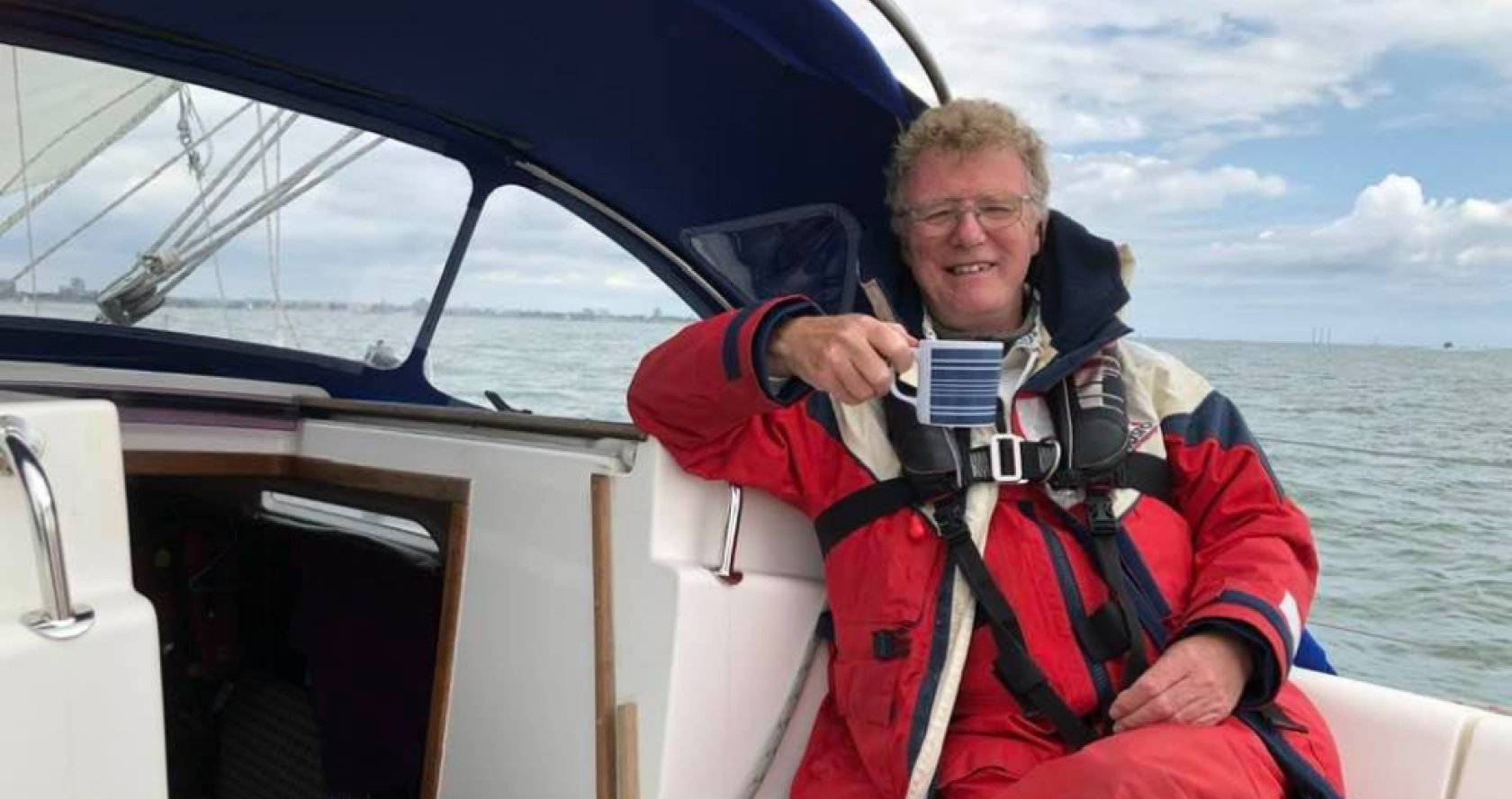 Stephen on a boat