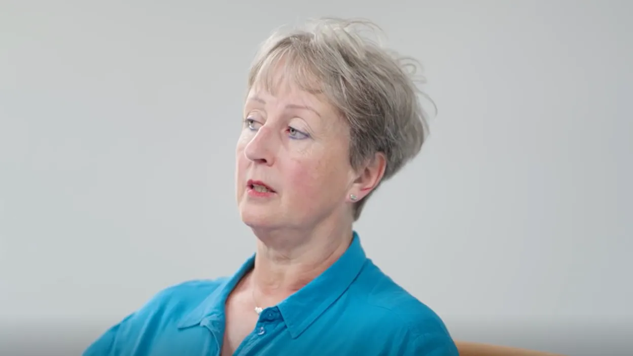 Helen looking away from the camera at an angle