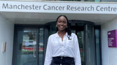 Adesewa in front of Manchester Cancer research centre 