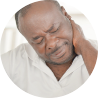 Man in pain massaging his neck