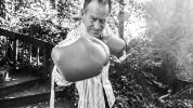 man with boxing gloves in B & W