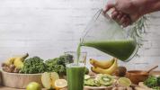 Pouring green smoothie