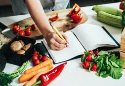 This image captures the essence of efficient meal preparation—fresh ingredients, strategic planning, and recipe organisation.