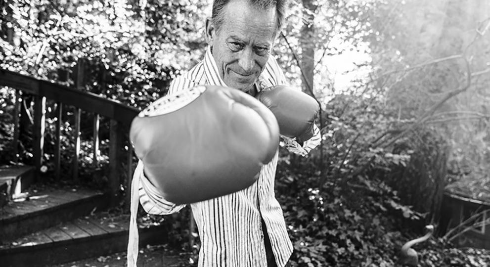 man with boxing gloves in B & W